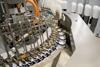 Fully automatic filling and sealing machine for the production of medicines in ampules.
