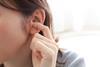 close up image woman ear