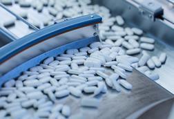 Tablets,And,Capsules,Manufacturing,Process.,Close-up,Shot,Of,Medical,Drug