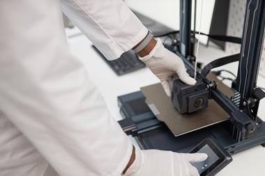 top-down-view-technician-3D-printing-machine