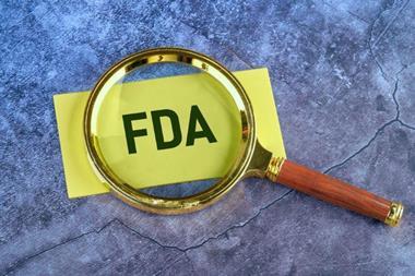Magnifying glass on FDA sign