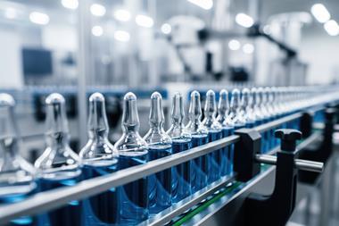 Sterile pharmaceutical assembly line with transparent vials moving in precision, clean manufacturing zone ensures regulated drug processing and quality control