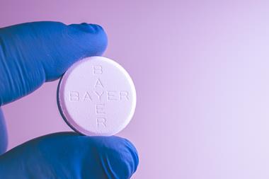 Bayer logo on white tablet