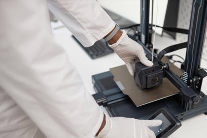 top-down-view-technician-3D-printing-machine