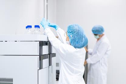 Unidentified,Operators,Are,Working,In,The,Chemical,Analysis,Equipment,Laboratory,